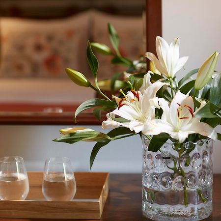 Simantro Resort Sani  Exterior photo A vase of flowers