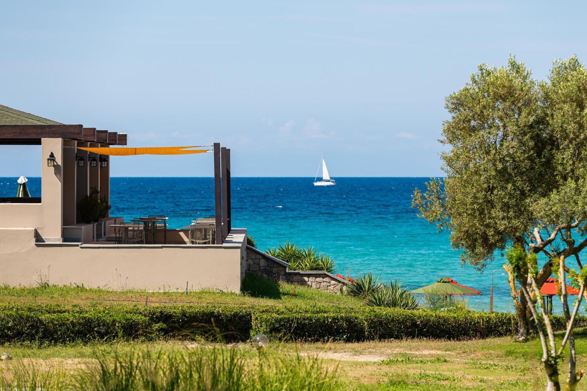 Simantro Resort Sani  Exterior photo View of the sea from the hotel