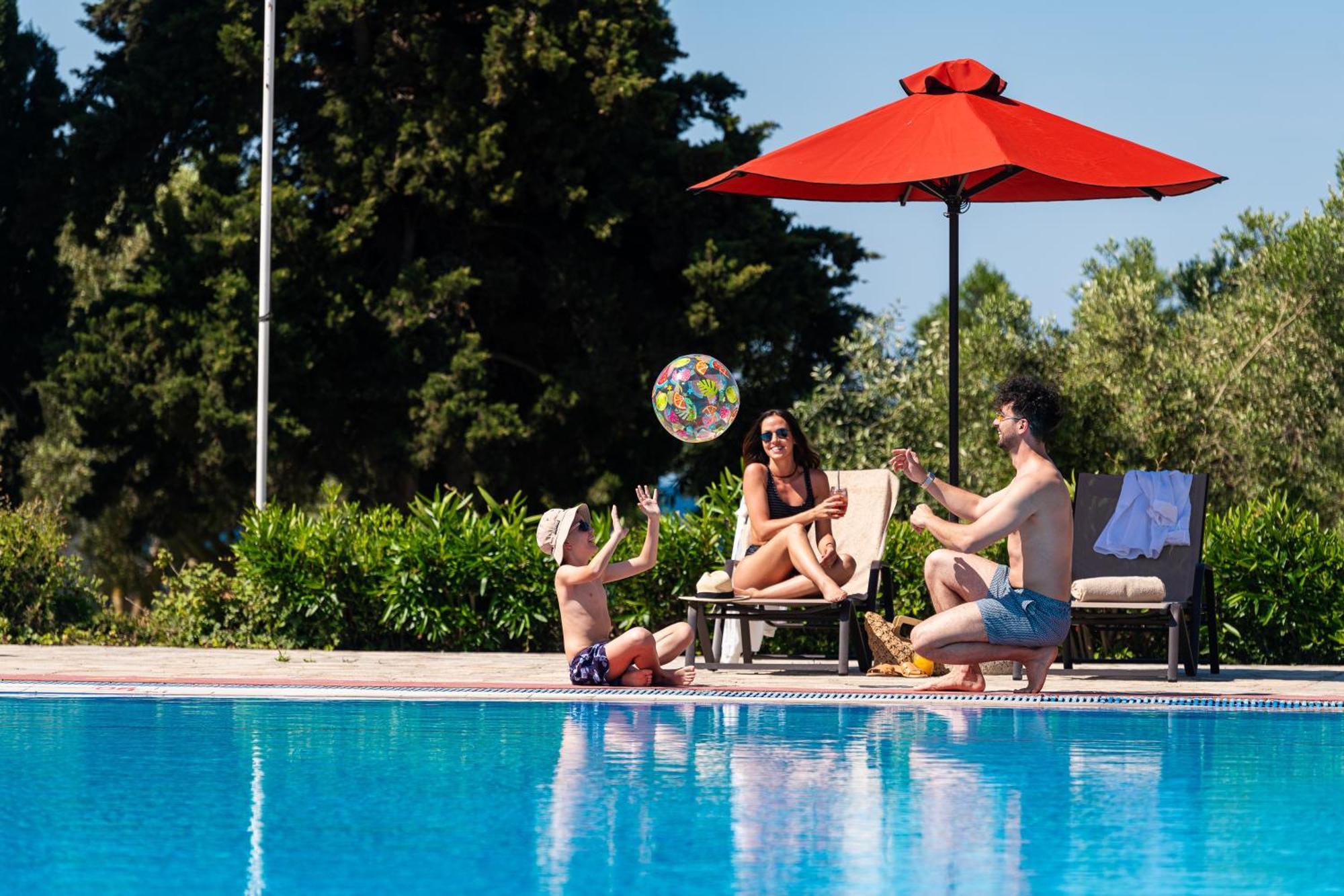 Simantro Resort Sani  Exterior photo Family at a pool